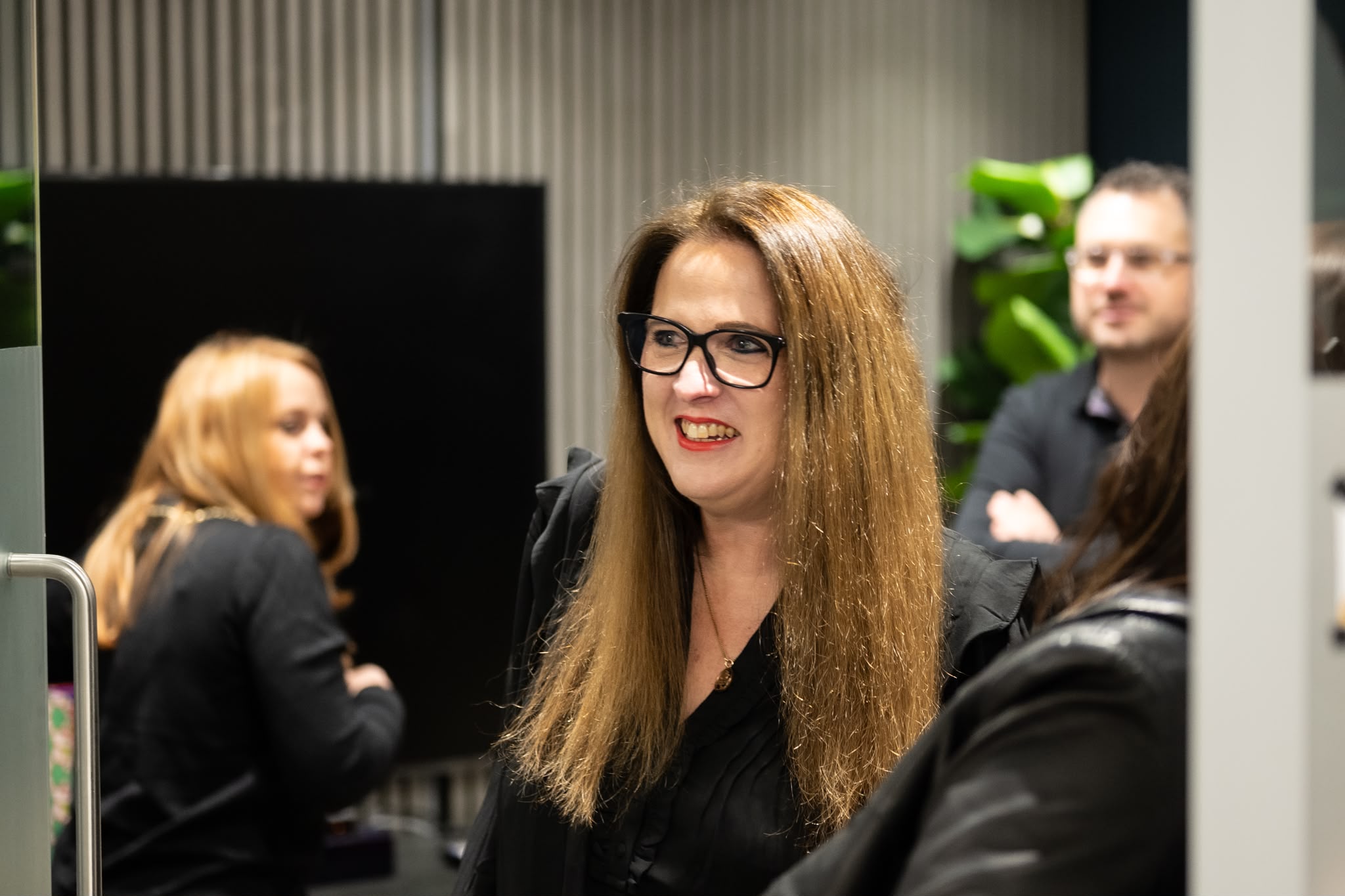 Jess Pressland in conversation at a professional event