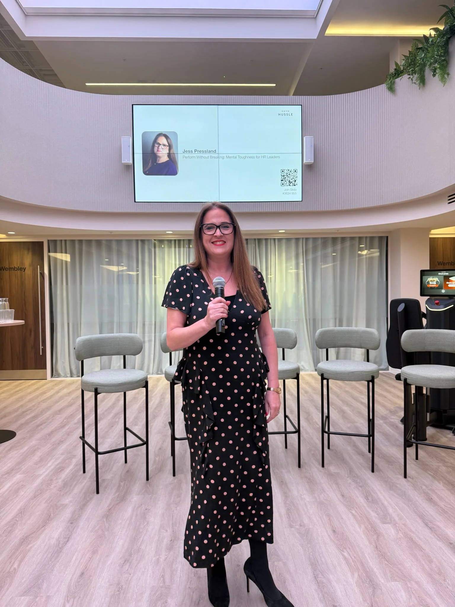 Jess speaking at a mental toughness event